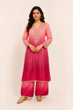 Elegant Peach & Magenta Ombre Pink design with intricate embroidery and matching palazzo pants.