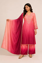 Elegant Peach & Magenta Ombre Pink design with intricate embroidery and matching palazzo pants.